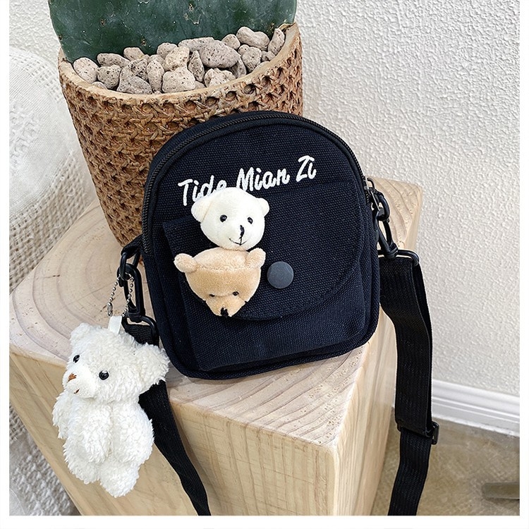 Τσαντάκι crossbody από καμβά για γυναίκες — σχήμα κάθετης τετράγωνης μορφής, σχέδιο με γράμματα, κλείσιμο με φερμουάρ, επένδυση από πολυεστέρα