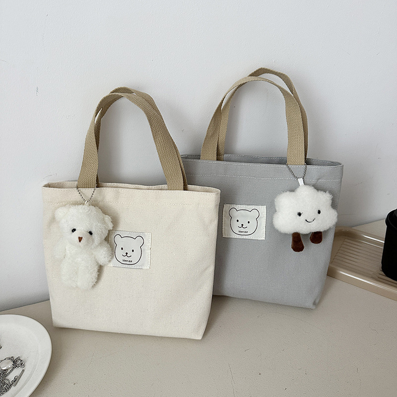 Sminktáska vászonból, függőleges négyzet alakú, cipzáras zárás, dupla fogantyúval