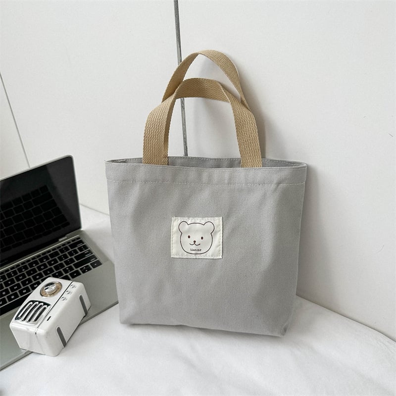 Sminktáska vászonból, függőleges négyzet alakú, cipzáras zárás, dupla fogantyúval