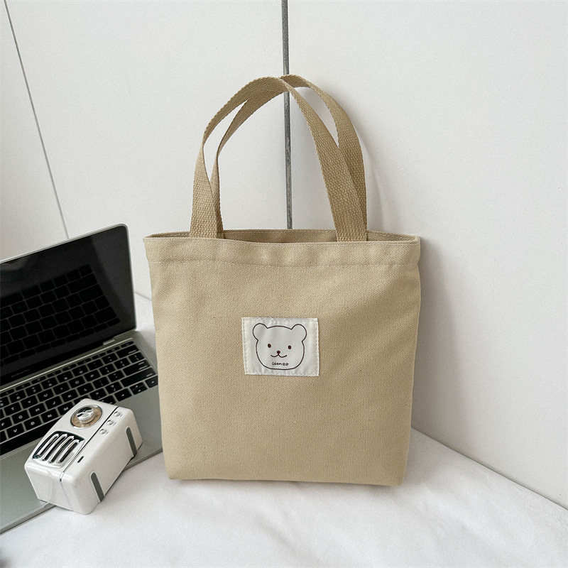 Sminktáska vászonból, függőleges négyzet alakú, cipzáras zárás, dupla fogantyúval