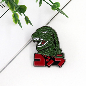 Broš – Personalizirana životinjska karikatura dinosaura Godzilla; materijal: legura; završna obrada: bojena; funkcija: ukrašavanje; unisex; izdanje: zima 2024