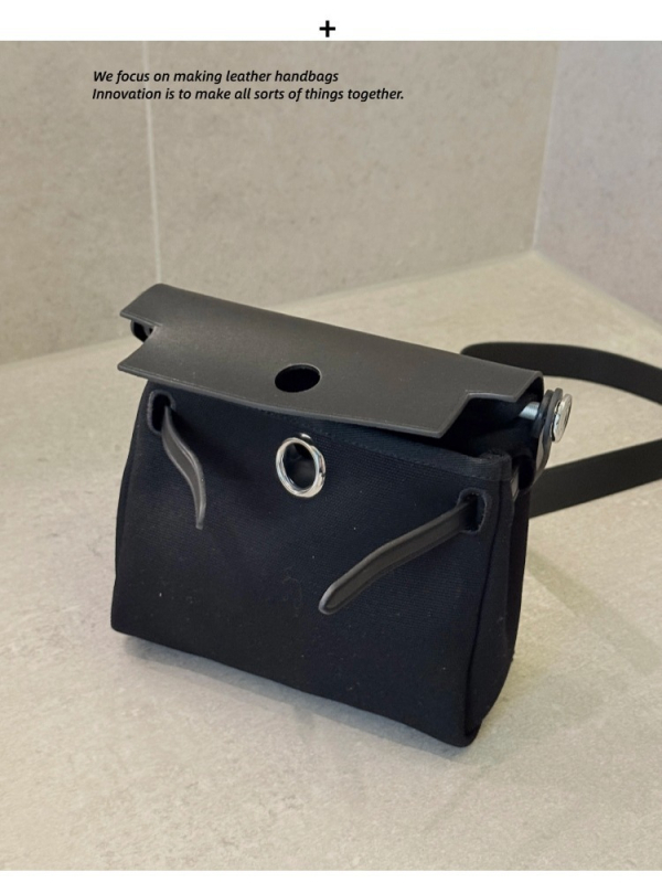 Ženska torba od prave kože crossbody bucket stila, podstava od platna, otvorený vrh, džep za mobitel, jedna naramenica