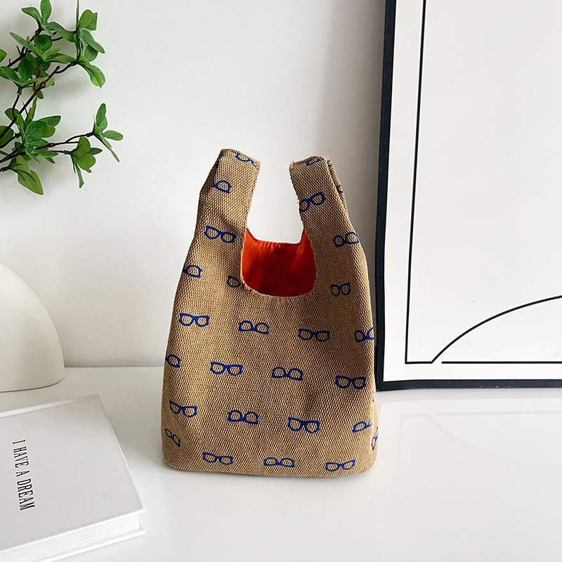 Torba od Oxford platna, vertikalni kvadratni oblik, otvoren vrh, pretinac za telefon, unutarnji pregradni dio