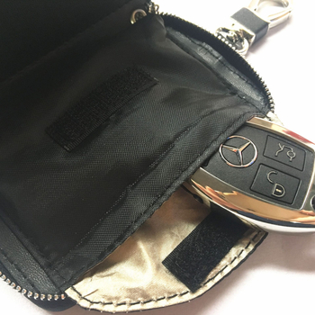 Torba za ključeve od prave kože s RFID zaštitom i zatvaračem na patentni zatvarač