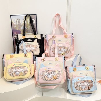 Nylonból készült crossbody táska lányoknak iskolai használatra, rajzfilm-stílus, kopásálló, csökkenti a terhelést, tárolható, poliészter bélés