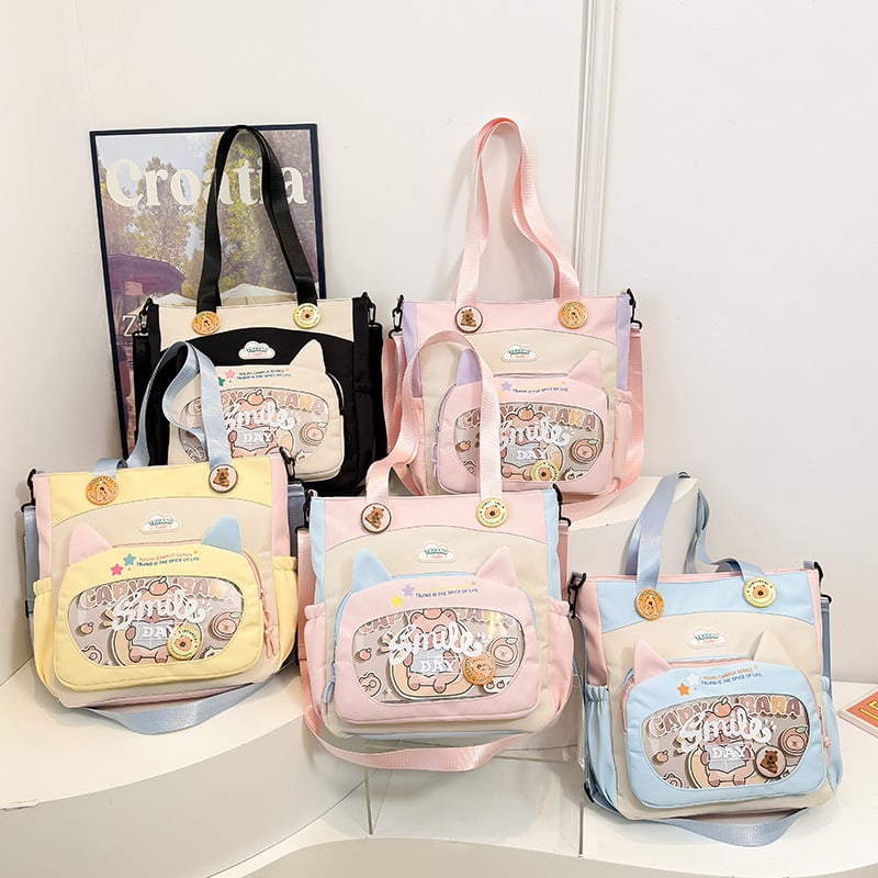 Nylonból készült crossbody táska lányoknak iskolai használatra, rajzfilm-stílus, kopásálló, csökkenti a terhelést, tárolható, poliészter bélés