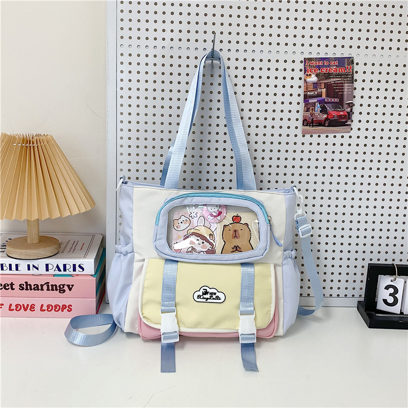 Nagy kapacitású iskolai hátizsák, nejlon anyagból, poliészter béléssel, lélegző, vízálló, ultrakönnyű, uniszex alsó tagozatosoknak és idősebbeknek.