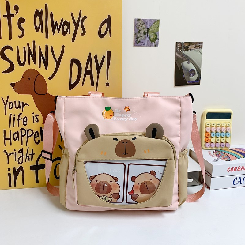 Capybara Oxford anyagból készült vízálló oldaltáska általános iskolás lányoknak, állatmintás, poliészter bélés, ősz 2025