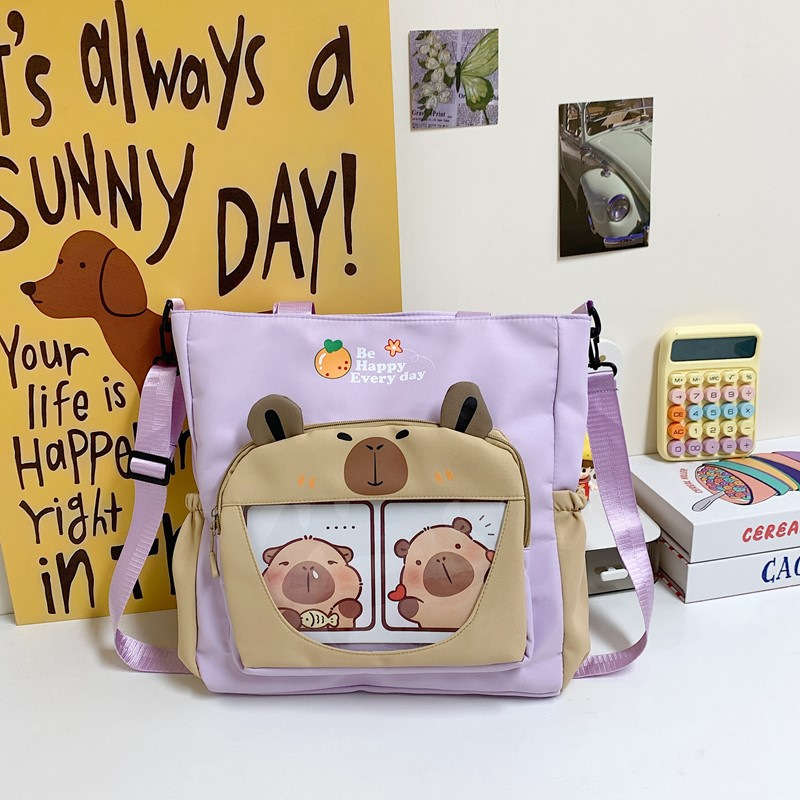 Capybara Oxford anyagból készült vízálló oldaltáska általános iskolás lányoknak, állatmintás, poliészter bélés, ősz 2025