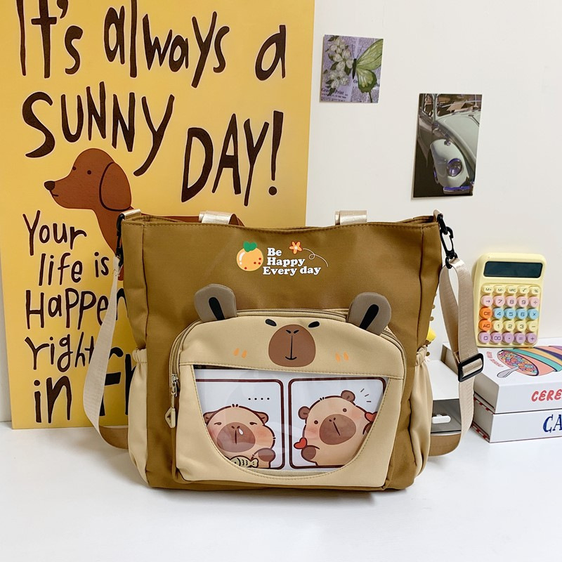 Capybara Oxford anyagból készült vízálló oldaltáska általános iskolás lányoknak, állatmintás, poliészter bélés, ősz 2025