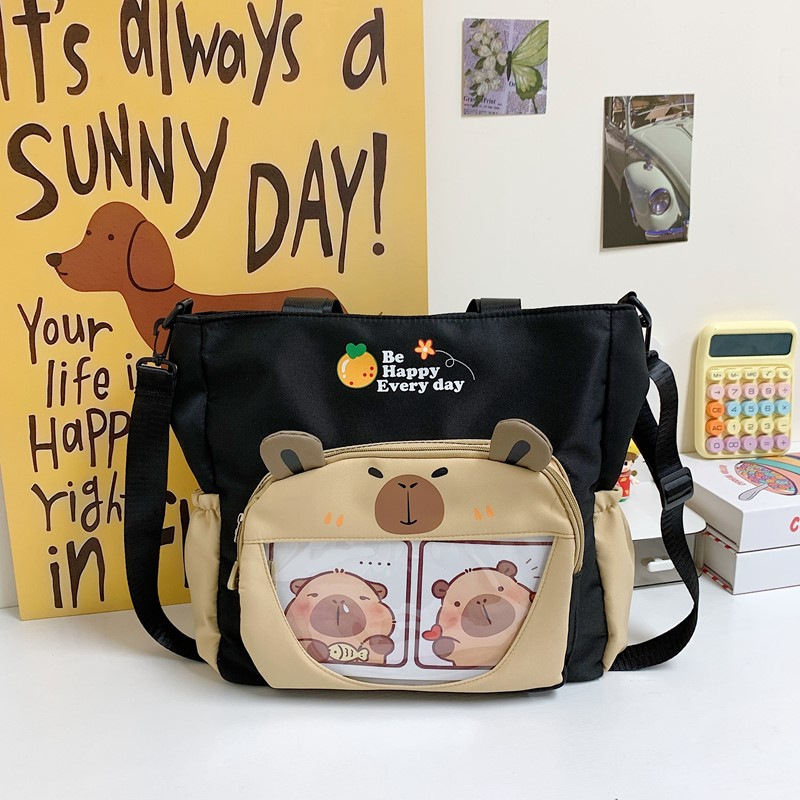 Capybara Oxford anyagból készült vízálló oldaltáska általános iskolás lányoknak, állatmintás, poliészter bélés, ősz 2025