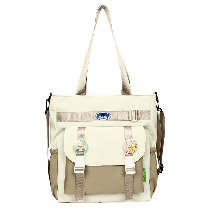 Crossbody torba za dopunske nastave za osnovnu školu – Kompozitni materijal, Podstava od poliestera, Smanjenje tereta, Unisex, Proljeće 2024