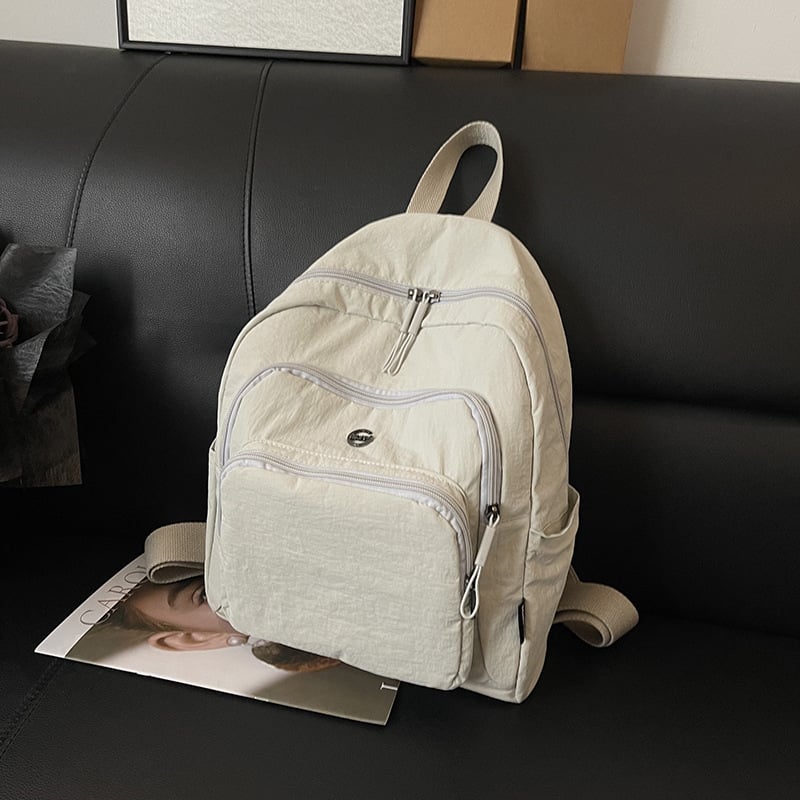 Nylon hátizsák szabadidős utazásokhoz, vízálló anyag, kapacitás 20 L alatt, görbült vállpántok