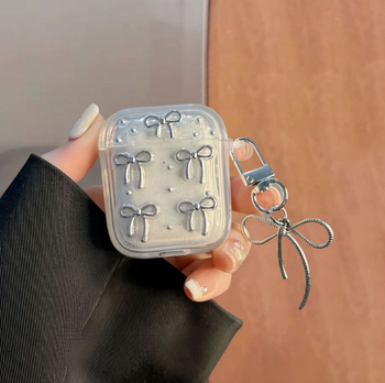 AirPods védőtok csillogó masnis lánccal, TPU anyag, imprint dizájn, kompatibilis az Apple AirPods-szal