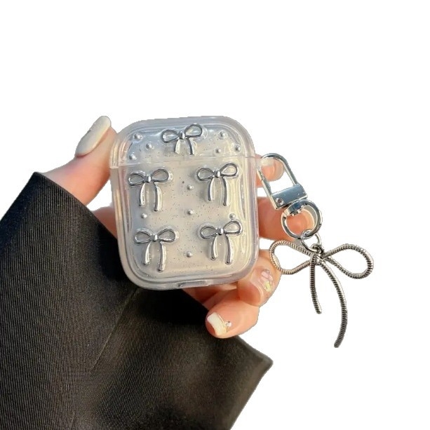 AirPods védőtok csillogó masnis lánccal, TPU anyag, imprint dizájn, kompatibilis az Apple AirPods-szal