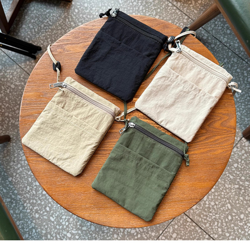 Izuzetno tanka, lagana crossbody torbica za telefon – minimalistički stil, unisex