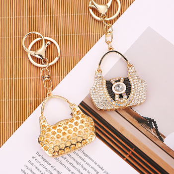 Kljucni lanac s kristalima, motiv torbe, metal, moderan minimalistički stil (Brand: Imperial Jiuko)