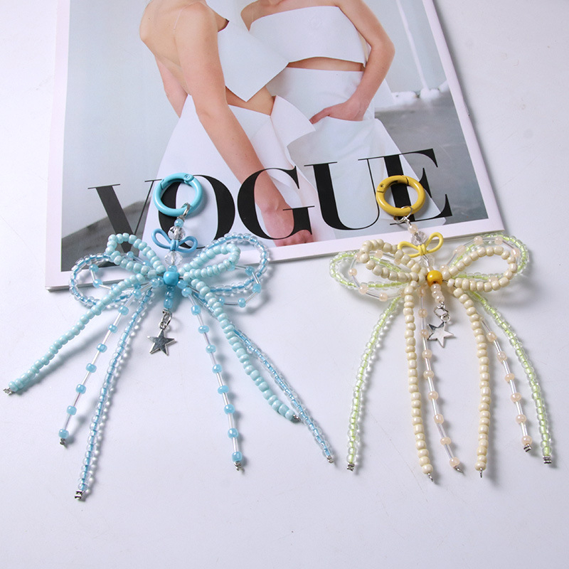 Breloc od perlica s metalnom mašnicom, ručno pleteni, modni lanac za telefon