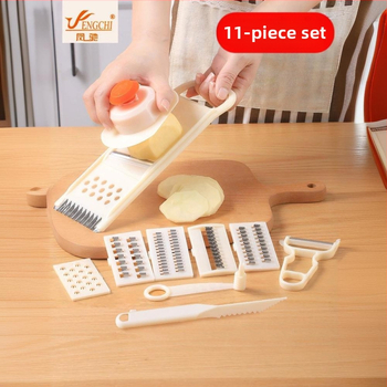 Daugelio funkcijų daržovių pjaustytuvas su tarkavimo, plokščių pjaustymo, bulvių skrebučių, vaisių pjaustymo ir rankos apsaugos priedais; privatūs ženklinimo variantai