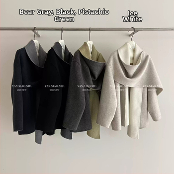 Moterų vilnos cape stiliaus paltas, vilnos mišinys 80–90% vilnos, ilgas, laisvas kirpimas, paslėptas sagų užsegimas, ilgos rankovės, pavasaris 2025