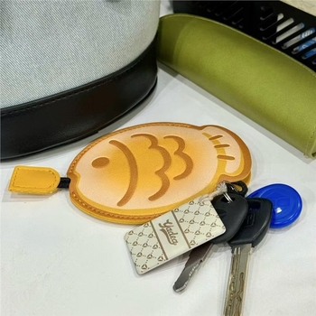 Taiyaki mesefigurás kulcstartó kihúzható dizájnnal - PU anyag, uniszex stílus, PU bélés, 2024 tavasza
