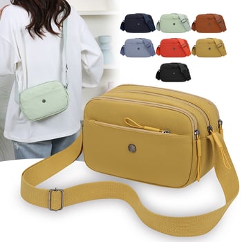 Crossbody torbica od Oxford materijala, horizontalnog kvadratnog oblika, zatvaranje na zip, laminirani unutarnji džep, jedan kaiš