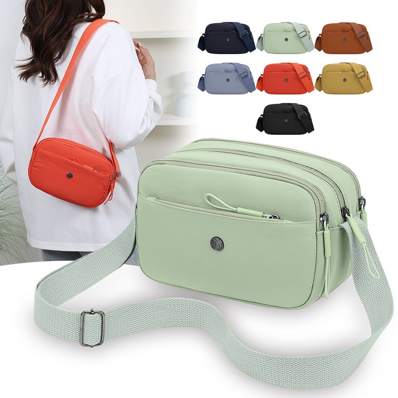 Crossbody torbica od Oxford materijala, horizontalnog kvadratnog oblika, zatvaranje na zip, laminirani unutarnji džep, jedan kaiš