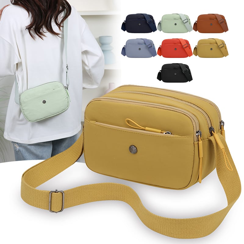 Crossbody torbica od Oxford materijala, horizontalnog kvadratnog oblika, zatvaranje na zip, laminirani unutarnji džep, jedan kaiš