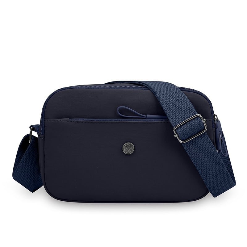 Crossbody torbica od Oxford materijala, horizontalnog kvadratnog oblika, zatvaranje na zip, laminirani unutarnji džep, jedan kaiš