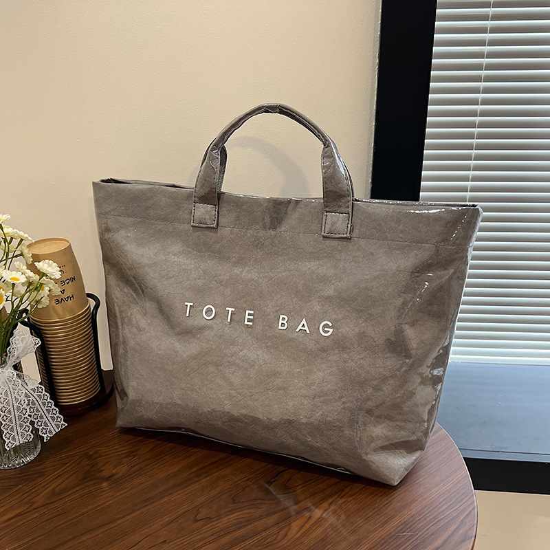 Jelly PVC Tote torba - prozirna, vodootporna, s džepom na zip za telefon i dokumente, vodoravni kvadratni oblik, Zima 2025