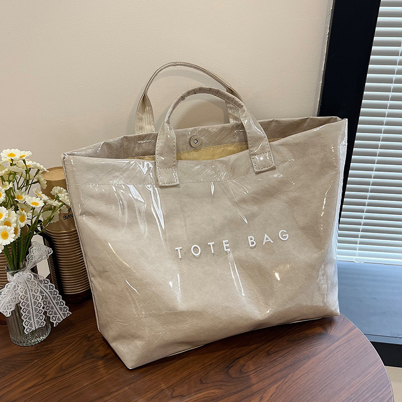 Jelly PVC Tote torba - prozirna, vodootporna, s džepom na zip za telefon i dokumente, vodoravni kvadratni oblik, Zima 2025