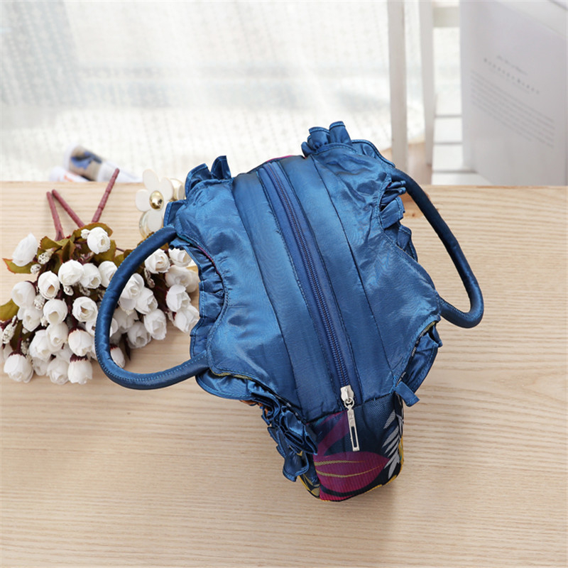 Love of Leigh ženska torbica, svilen materijal, Dumpling bag stil, ovalni oblik, zatvaranje zatvaračem