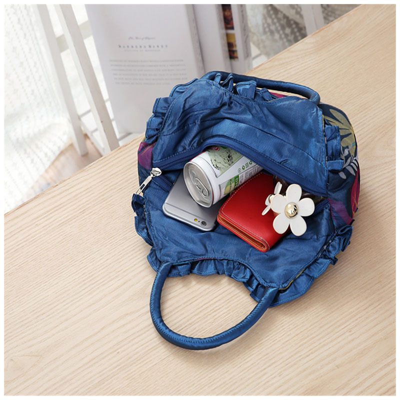 Love of Leigh ženska torbica, svilen materijal, Dumpling bag stil, ovalni oblik, zatvaranje zatvaračem