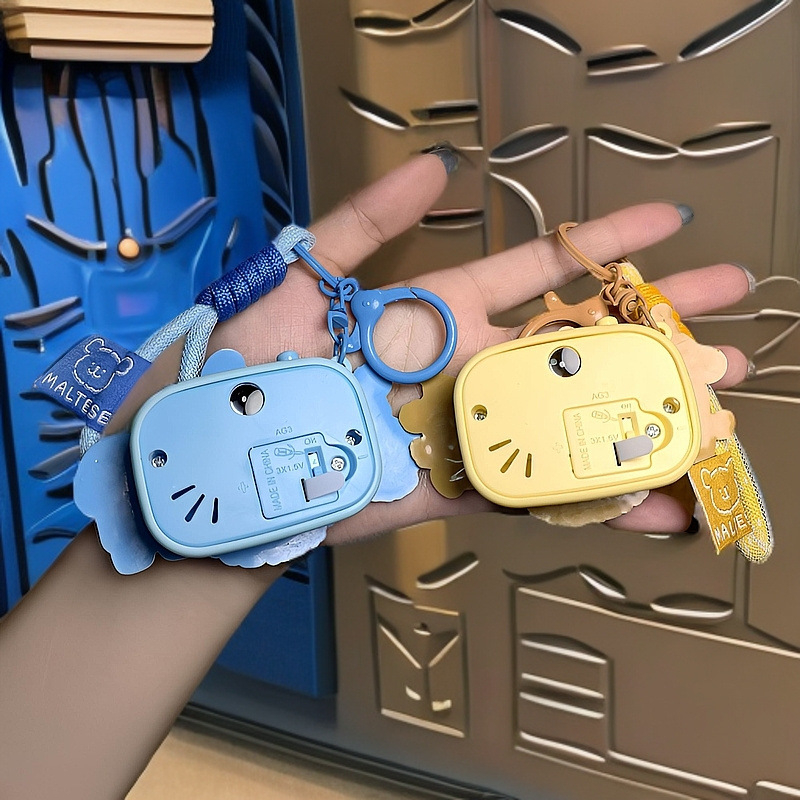 Kulcstartó – projektáló kamera sorozat, vonalas kutya, aranyos rajzfilm kar a táskákhoz és autókhoz (IP nem engedélyezett)