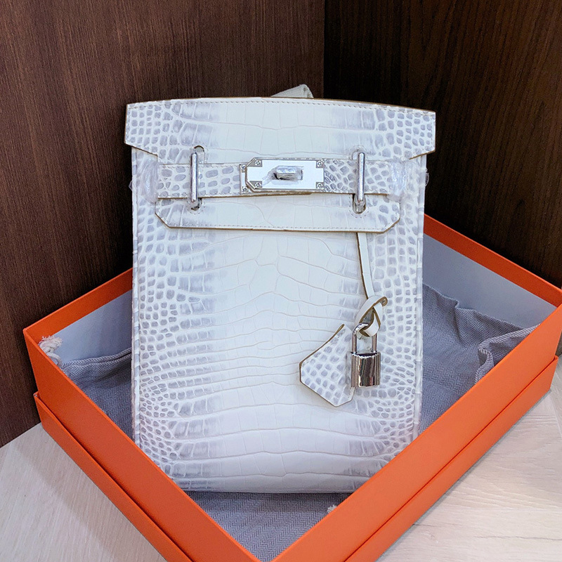 Unisex torba za prsa s Lychee uzorkom od gornjeg sloja teleće kože, crossbody stil, zatvaranje lokkom, unutarnji džepovi za telefon i dokumente, ljeto 2025