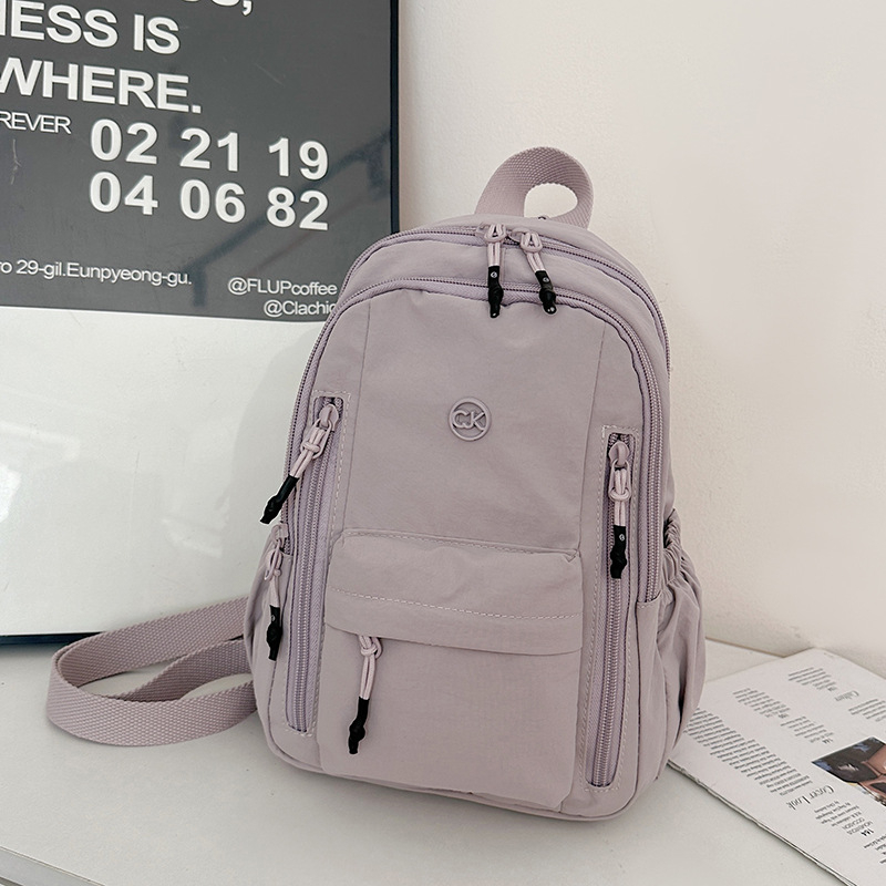 Unisex nylon ruksak za svakodnevnu upotrebu i putovanja, kapacitet 20–35 L, pogodan za 14-inčni laptop, lagan, remeni s jastukom zraka, ležerni stil putovanja