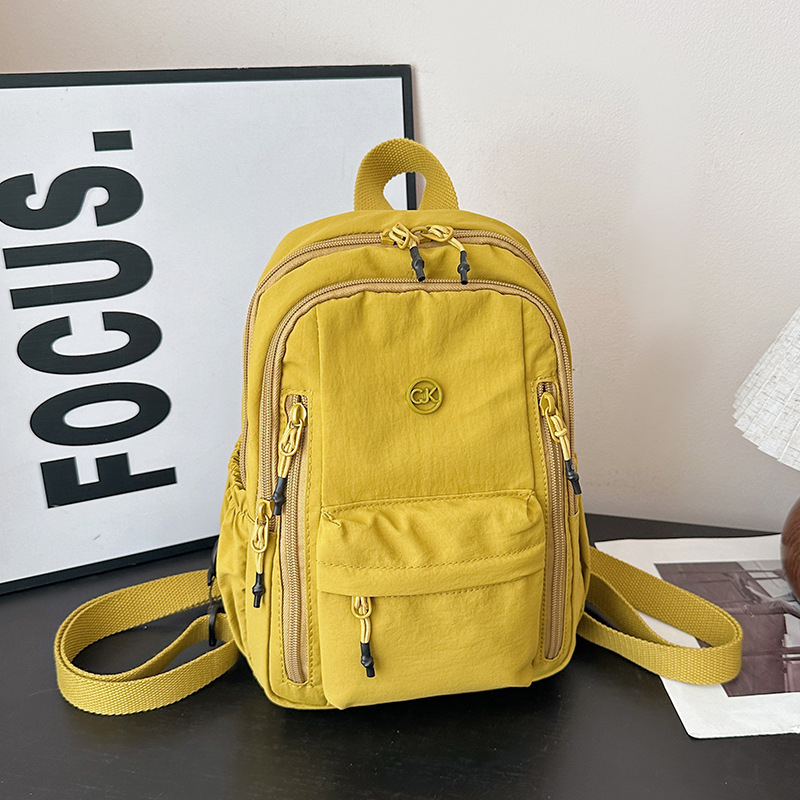 Unisex nylon ruksak za svakodnevnu upotrebu i putovanja, kapacitet 20–35 L, pogodan za 14-inčni laptop, lagan, remeni s jastukom zraka, ležerni stil putovanja