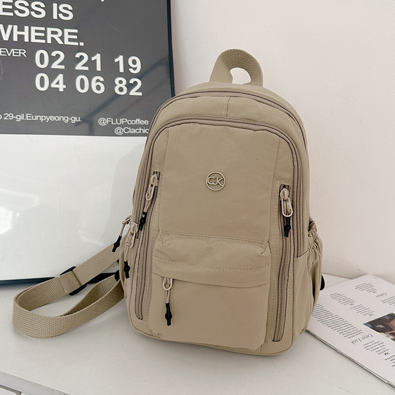 Unisex nylon ruksak za svakodnevnu upotrebu i putovanja, kapacitet 20–35 L, pogodan za 14-inčni laptop, lagan, remeni s jastukom zraka, ležerni stil putovanja