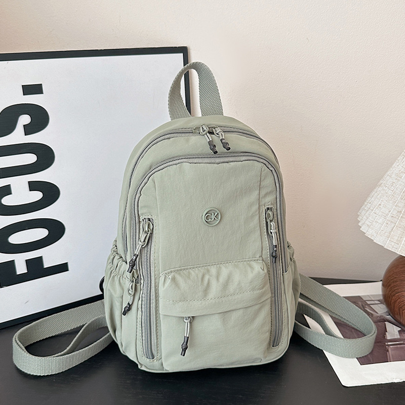 Unisex nylon ruksak za svakodnevnu upotrebu i putovanja, kapacitet 20–35 L, pogodan za 14-inčni laptop, lagan, remeni s jastukom zraka, ležerni stil putovanja