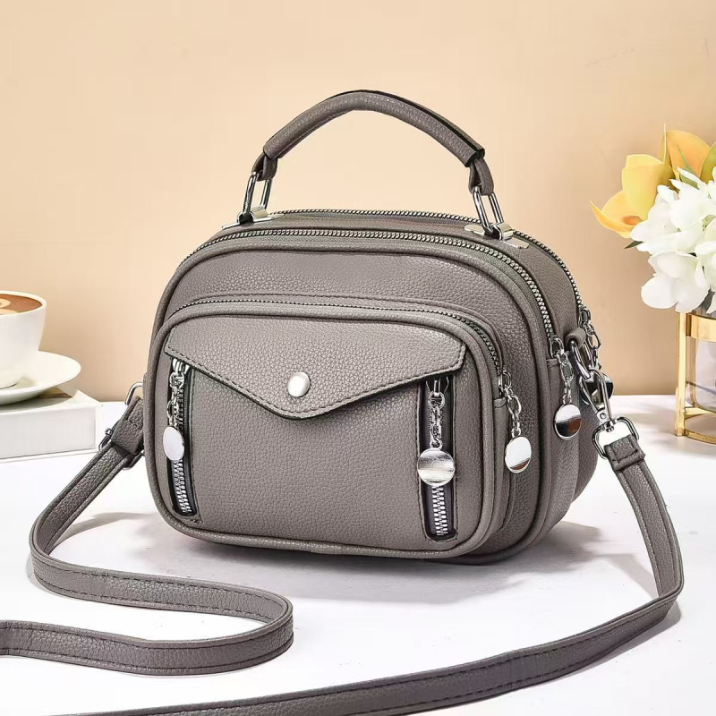 Crossbody torba od PU, horizontalni kvadratni oblik, zatvaranje zipom, unutarnja džep s zipom i džep za telefon