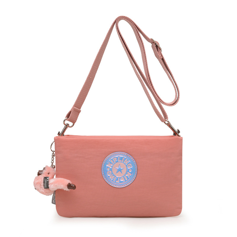 Muniu najlon crossbody torba — horizontalni kvadratni oblik, zatvaranje na zip, skriveni džep sa zipom