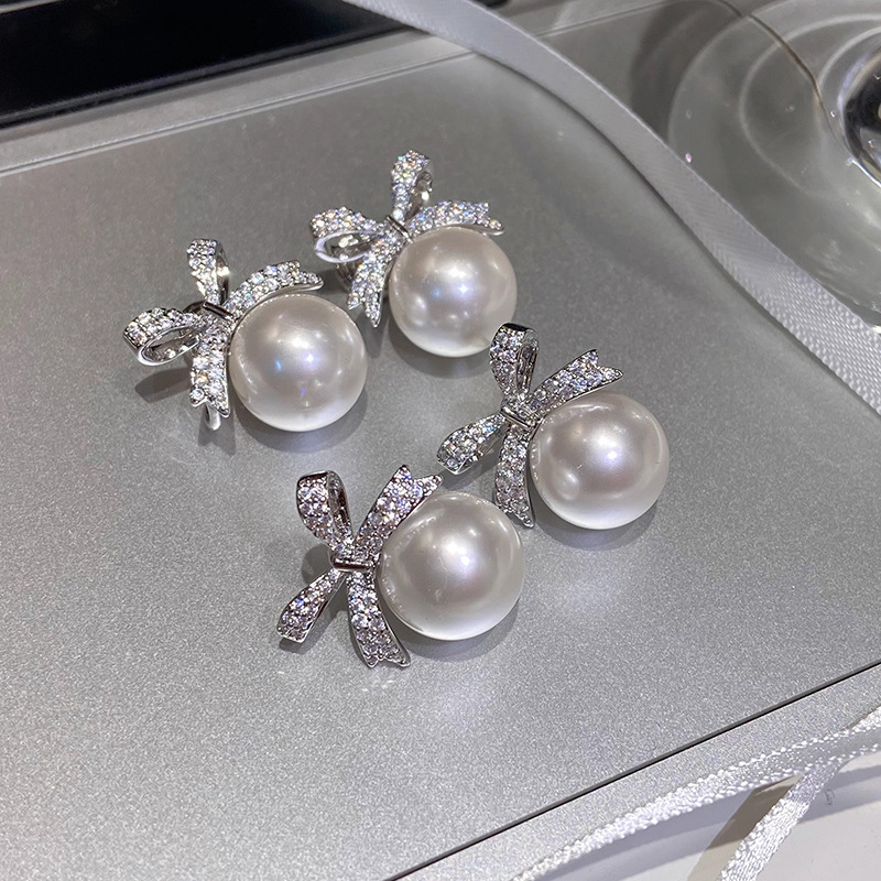 Cercei cu formă de funda din aliaj, placare electrolitică, știfturi din argint 925, stil lux lejer