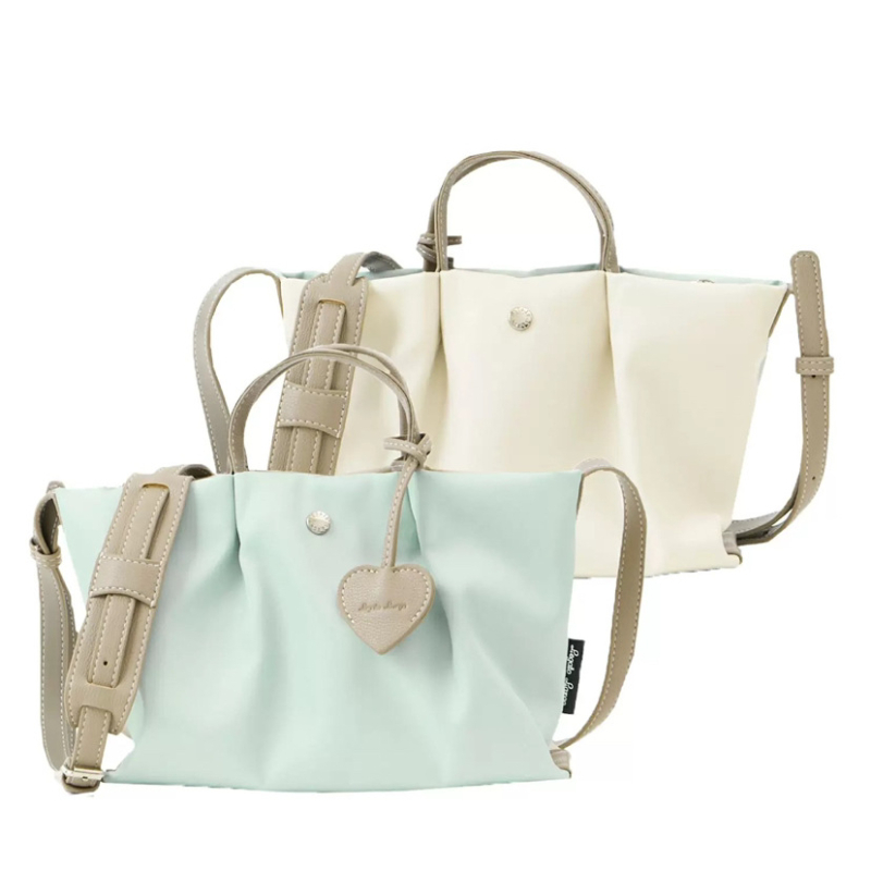 Nylon torbica za rame s crossbody stilom, zatvaranje na zip, unutarnja zip pretinac, dumpling oblik, jedna naramenica, ulični stil