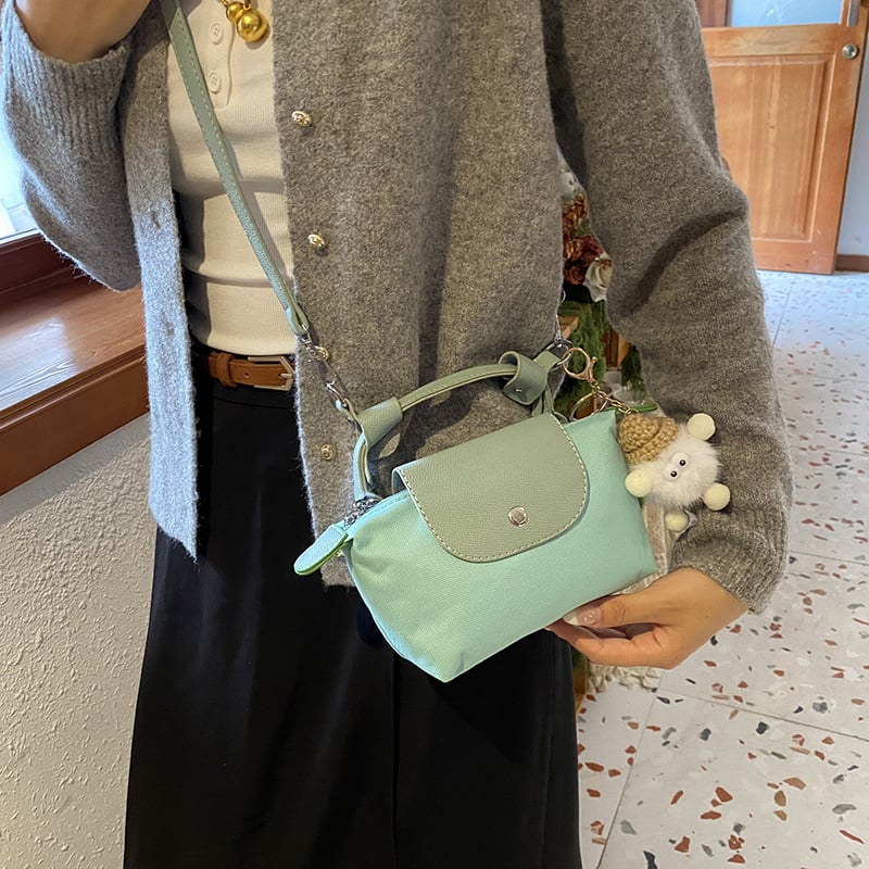 Ženska crossbody torba u obliku knedle, PVC materijal, džep za mobitel, zatvarač s poklopcem, ulični stil