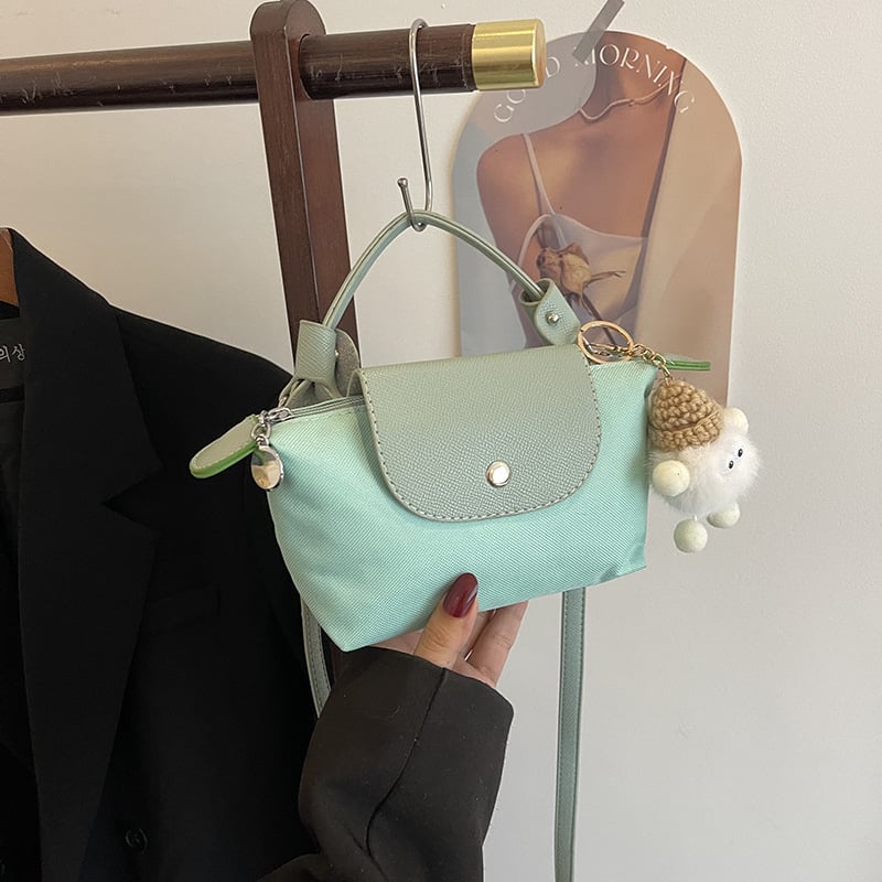 Ženska crossbody torba u obliku knedle, PVC materijal, džep za mobitel, zatvarač s poklopcem, ulični stil