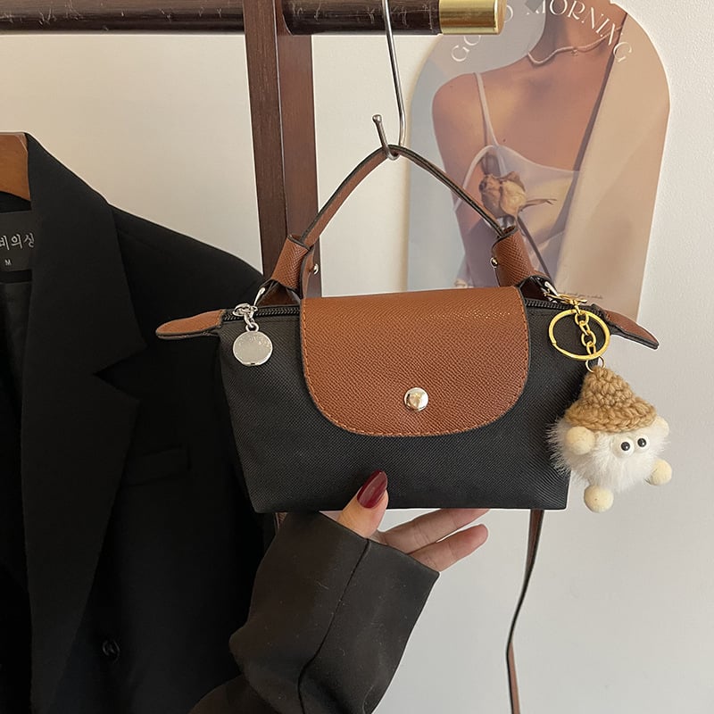 Ženska crossbody torba u obliku knedle, PVC materijal, džep za mobitel, zatvarač s poklopcem, ulični stil