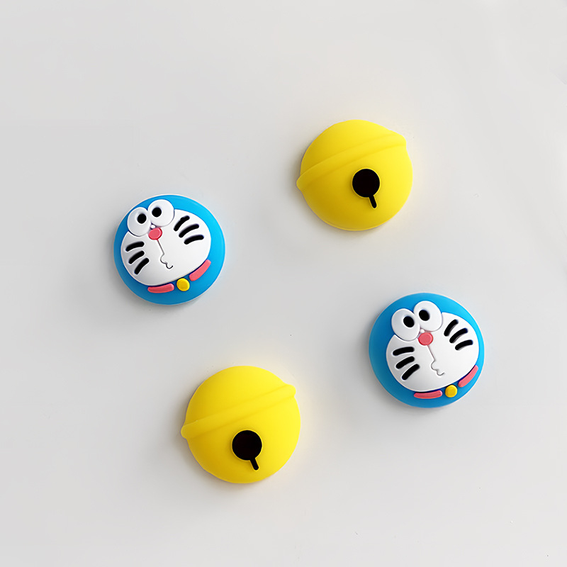 Nintendo Switch džojstik poklopac, silikon, protivklizni, Doraemon zvončić motiv, prilagodljivo s fotografijama, dimenzije 2x2x0,5 cm