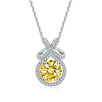 Réz ékszerszett: nyaklánc, fülbevaló és gyűrű; Bow motívum, réz medál, O-lánc, elektroplatált felület; geometriai stílus