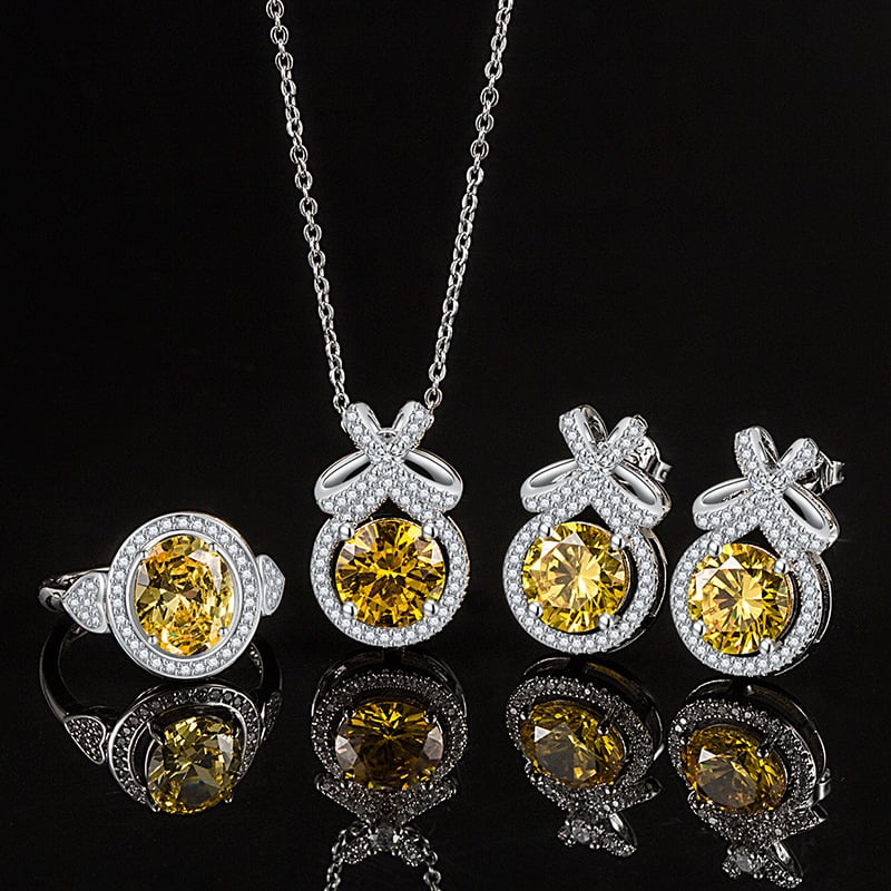 Réz ékszerszett: nyaklánc, fülbevaló és gyűrű; Bow motívum, réz medál, O-lánc, elektroplatált felület; geometriai stílus