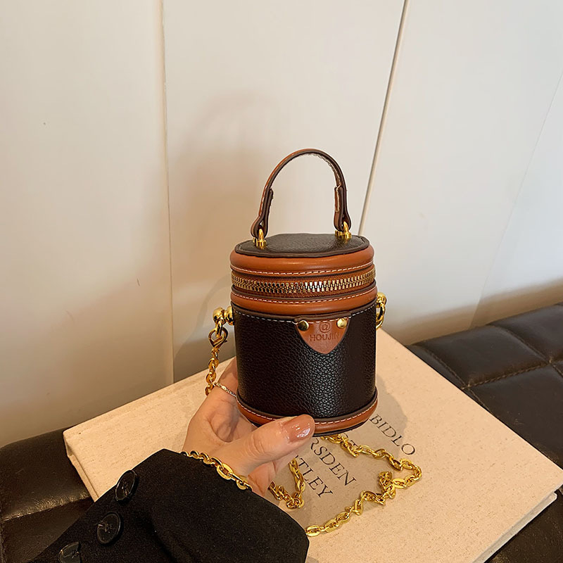 Bucket torba od PU, cilindrični oblik, zatvaranje zipom, džep za telefon, jedan naramenica